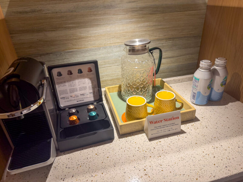 nespresso machine and water at canopy by hilton in okinawa miyako island