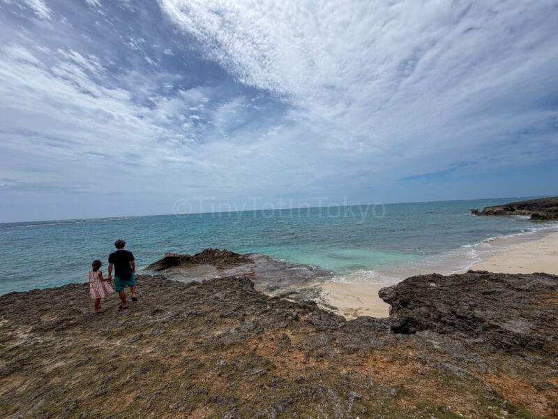 a parent and child at musunun beach in Miyakojima