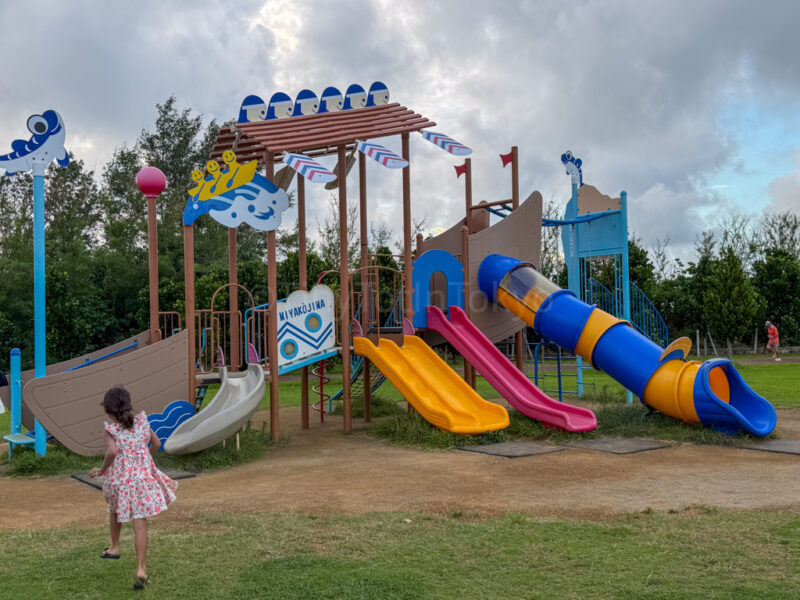 a child at Painagama Umisora Sukoyaka Park in Miyakojima
