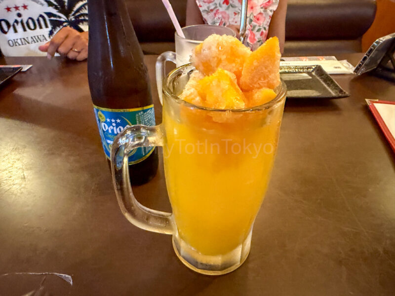 korokoro mango sour at an izakaya in miyakojima