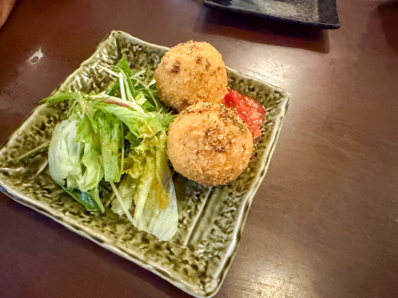 taco rice croquettes at Shimauta Izakaya Kiyama in Miyakojima