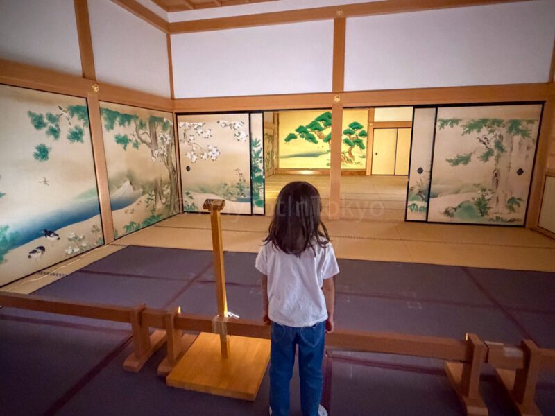 a child in honmaru palace near nagoya castle