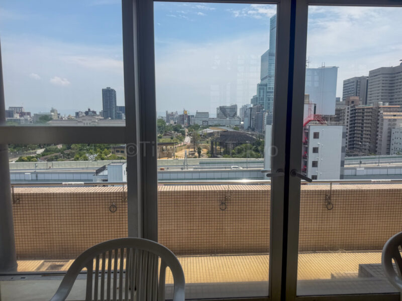 table to eat at pool area of spa world osaka