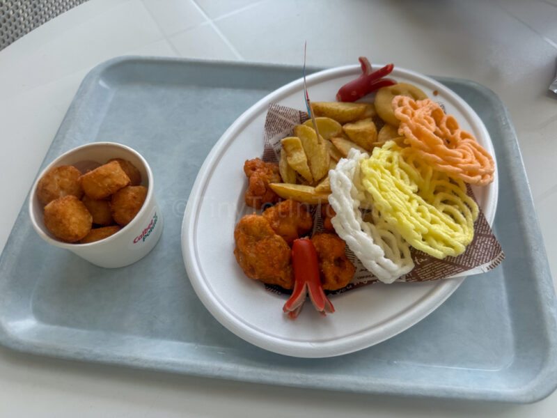 fried food at pool area at spa world osaka
